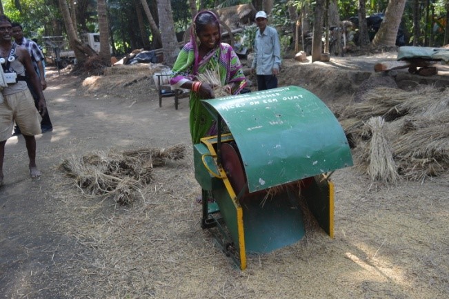 Demonstration of pedal thresher with safetycover
